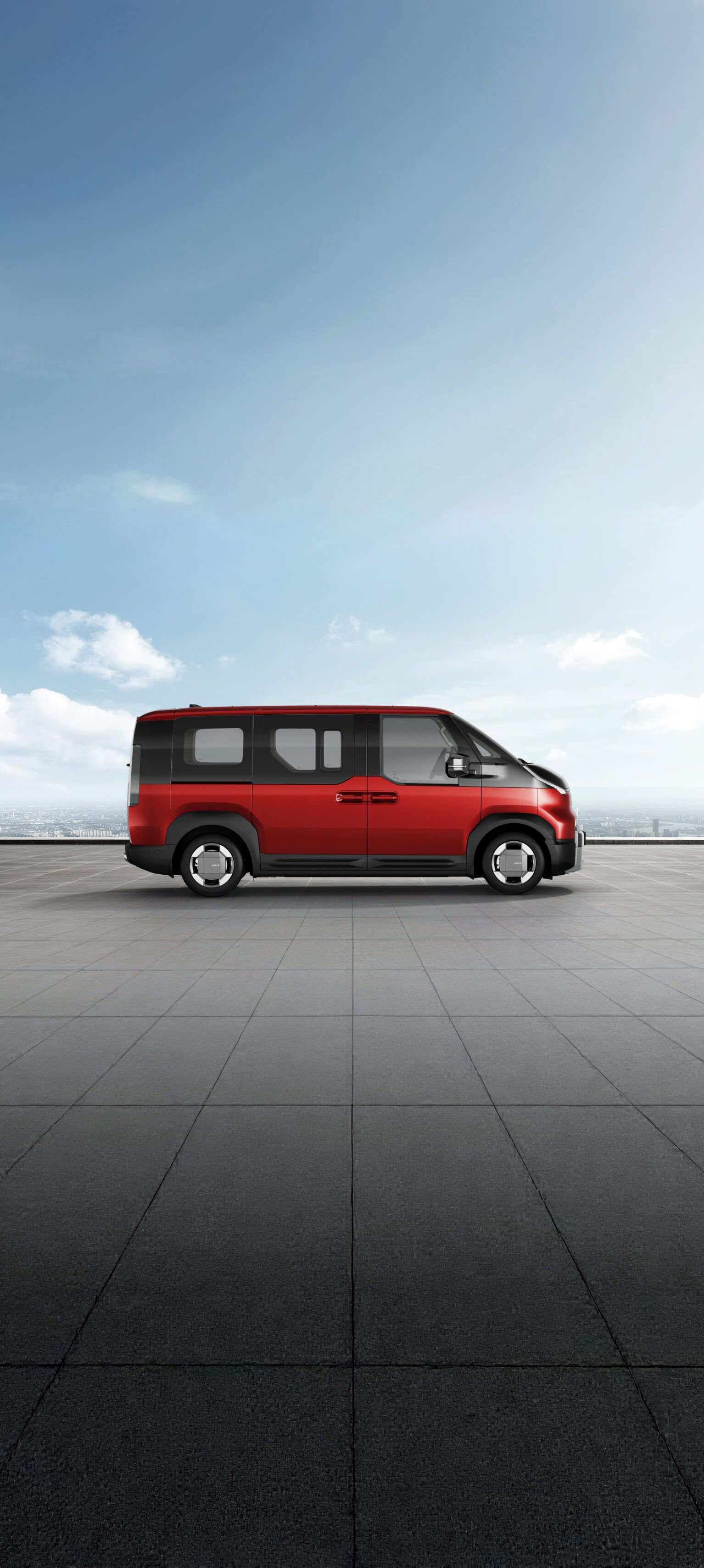 Side view of the Kia PV5 Passenger in runway red shown on exterior color visualizer