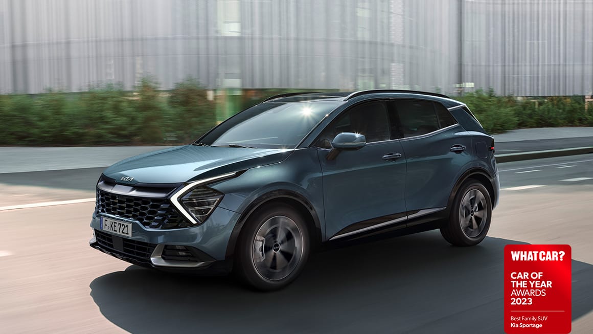Kia Sportage driving in the city